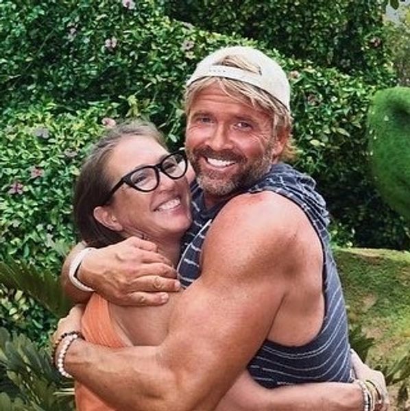Bonna is hugging Jesse congratulating him for completing a thought without squirrels present 
