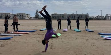 group surf lesson on Essaouira’s beach, an authentic adventurous activity on Morocco’s coast