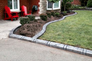 curbing drive ways and bordering flower beds