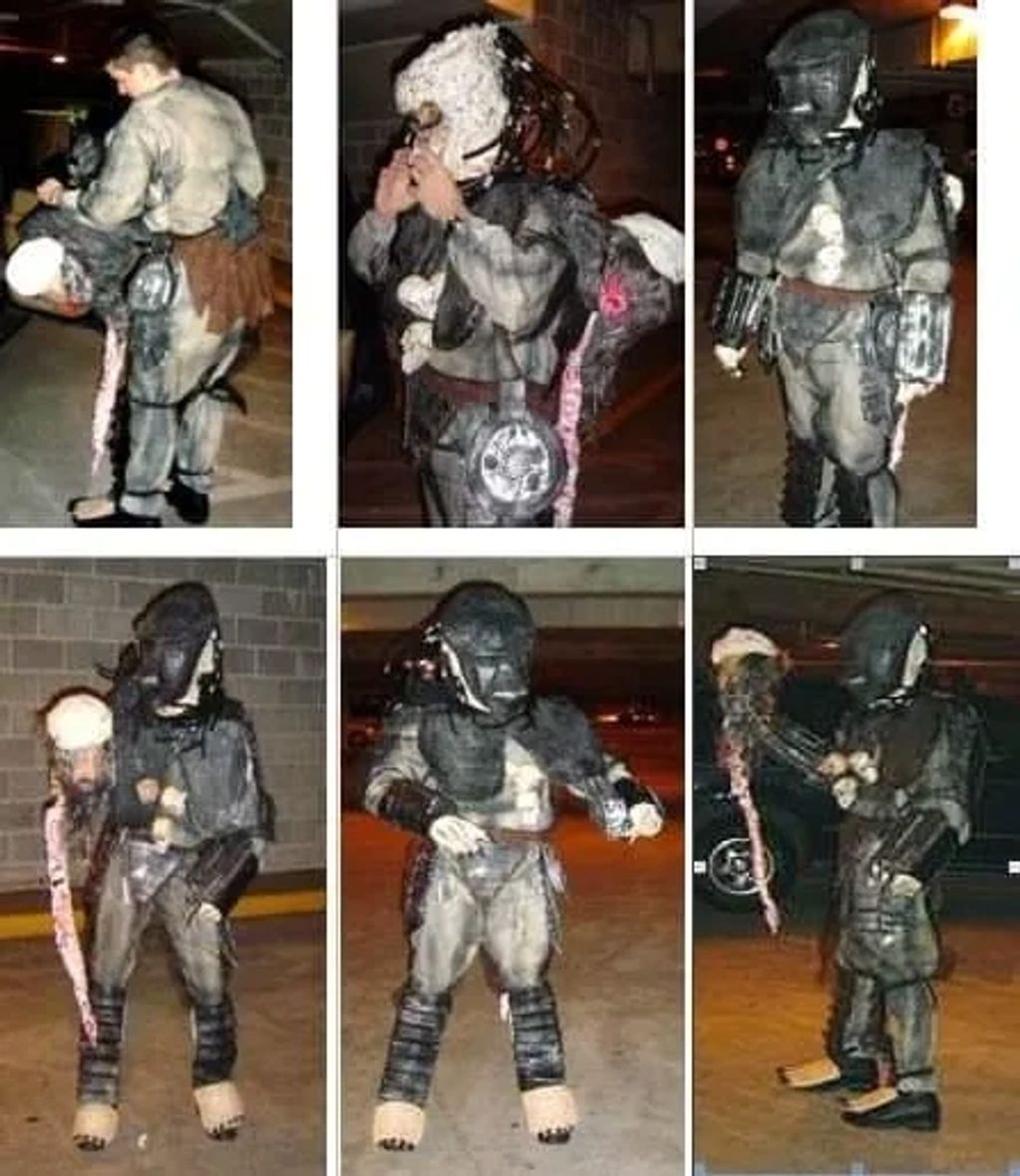 Costume, set design.  2001 Predator costume holding an Osama Bin Laden head/Spinal Cord. After 9/11