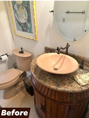 A vintage-style bathroom with a beige toilet and sink.