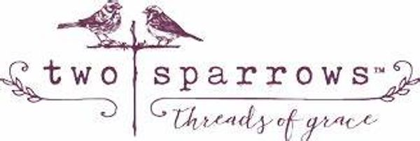 Logo with two sparrows and elegant text for 'two sparrows threads of grace'.