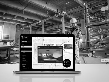 Laptop displaying a design software interface in a construction site.
