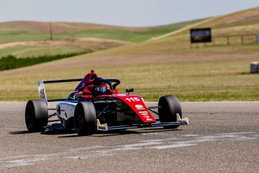 Formula-style race car on a track.