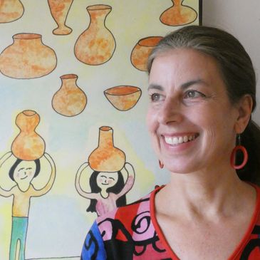 Artist Anna Jalickee and a Painting in the background 