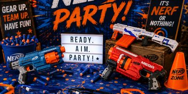 Colorful Nerf guns and darts set up for a party with vibrant decorations.