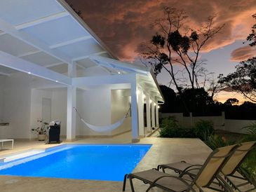 A nice photo of the house at sunset from the pool. Pavones is a few minutes away...