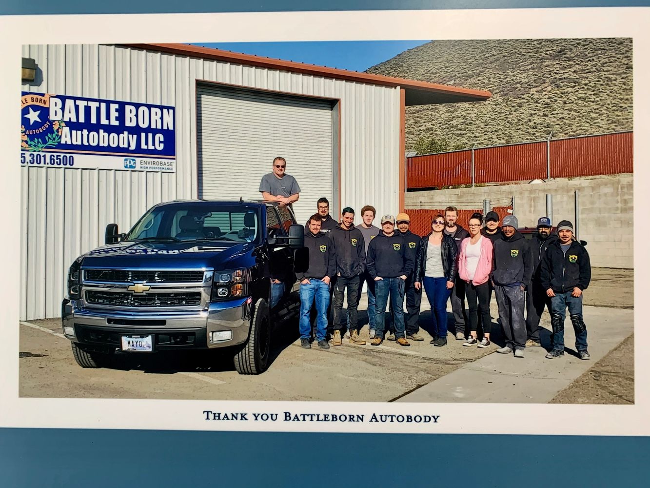 The crew at Battle Born Autobody