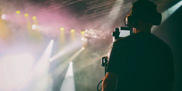 AV crew providing dynamic event support with equipment setup and operation