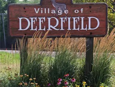 Brown Wooden Sign - Village of Deerfield