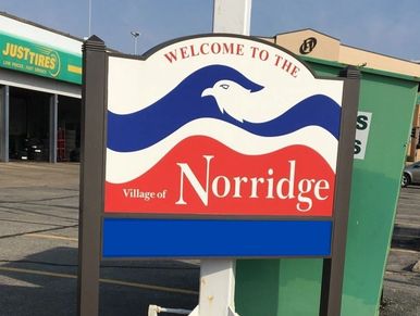 Red White and Blue Sign - Welcome to The Village of Norridge, IL
