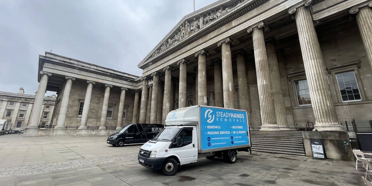 Removals van parked outside a commercial property