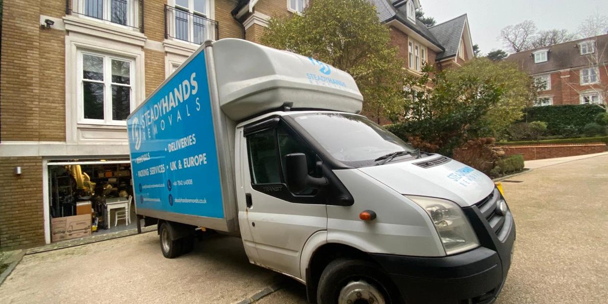 House removal van parked on driveway