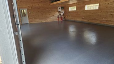 Epoxy paint flake and quartz shop floor , broadcast system.