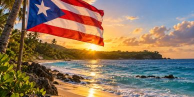 Puerto Rican flag waving at sunset on the beach.