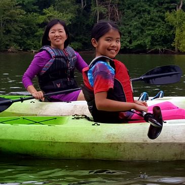 Mother and daughter kayaking