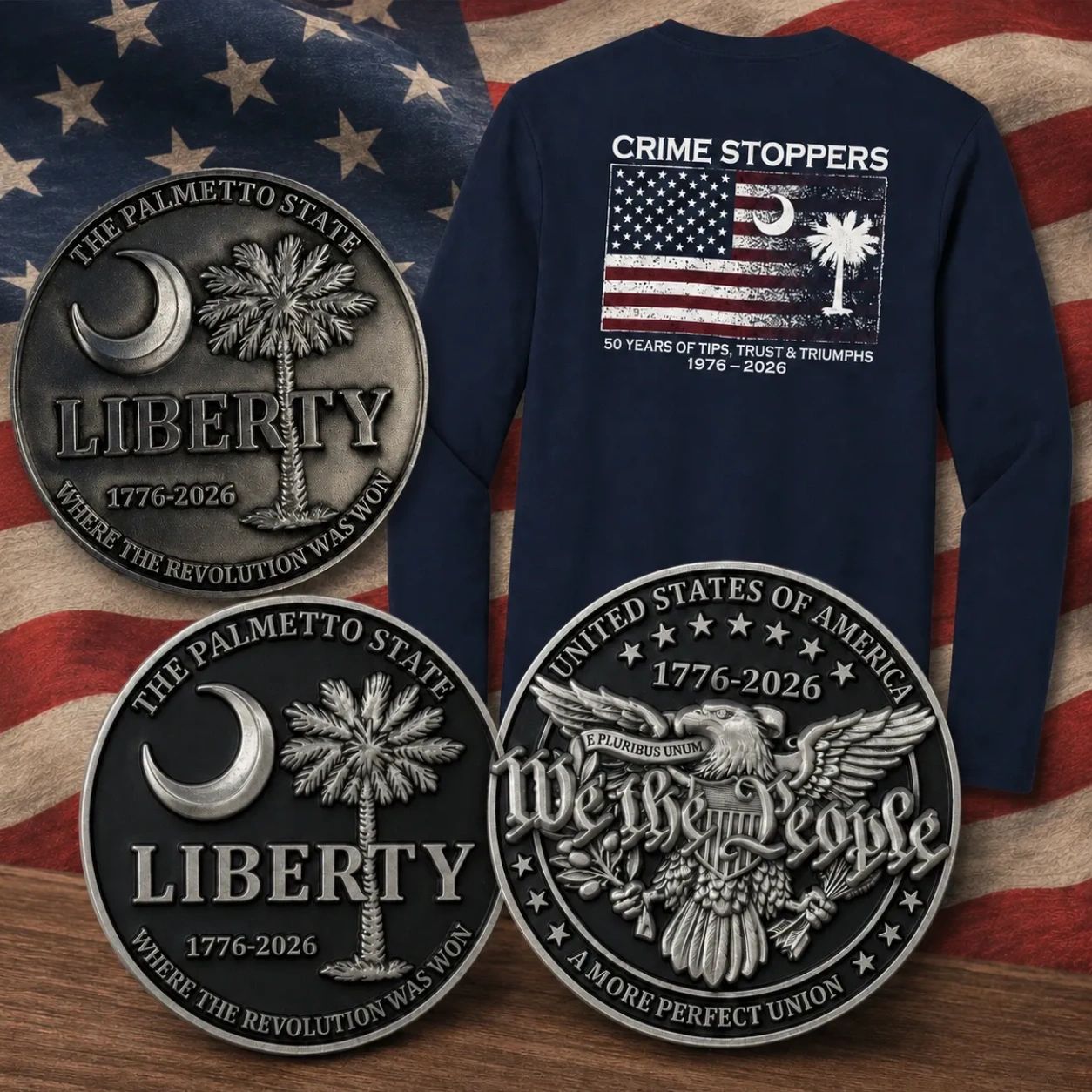 Commemorative coins and a Crime Stoppers shirt celebrating American liberty and history from 1776-2026.