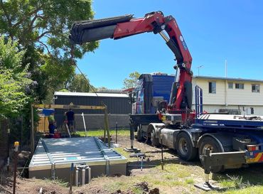 Plunge pool installation with a crane truck