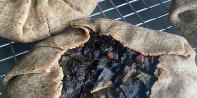 Southwestern Galette
Peppers and black beans simmered in chipotle spices, over a layer of avocado.