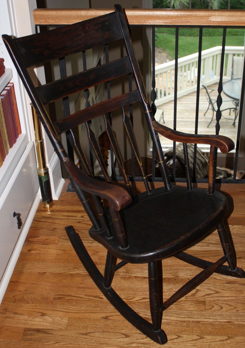 antique black rocking chair