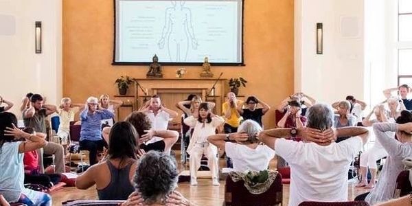 A group of people going yoga.