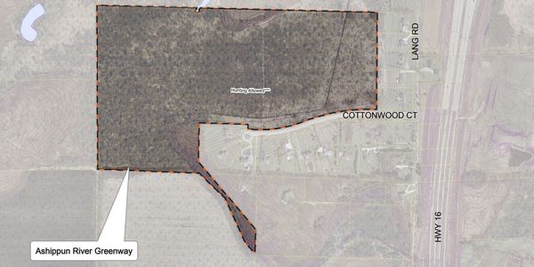 Aerial view of a forested area near Ashippun River Greenway.