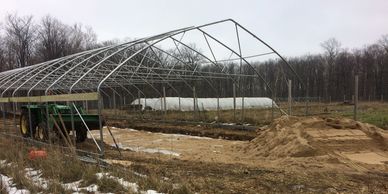 Solar heating is part of greenhouse basics but how about storing heat for early and late plantings?