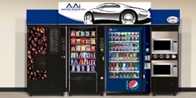 Wall of vending machines including coffee, snacks, drinks, and microwaves.
