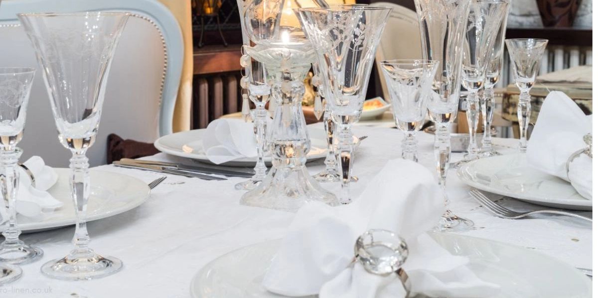 Elegant napkins on a table with a matching cover and runner for a stylish setup
