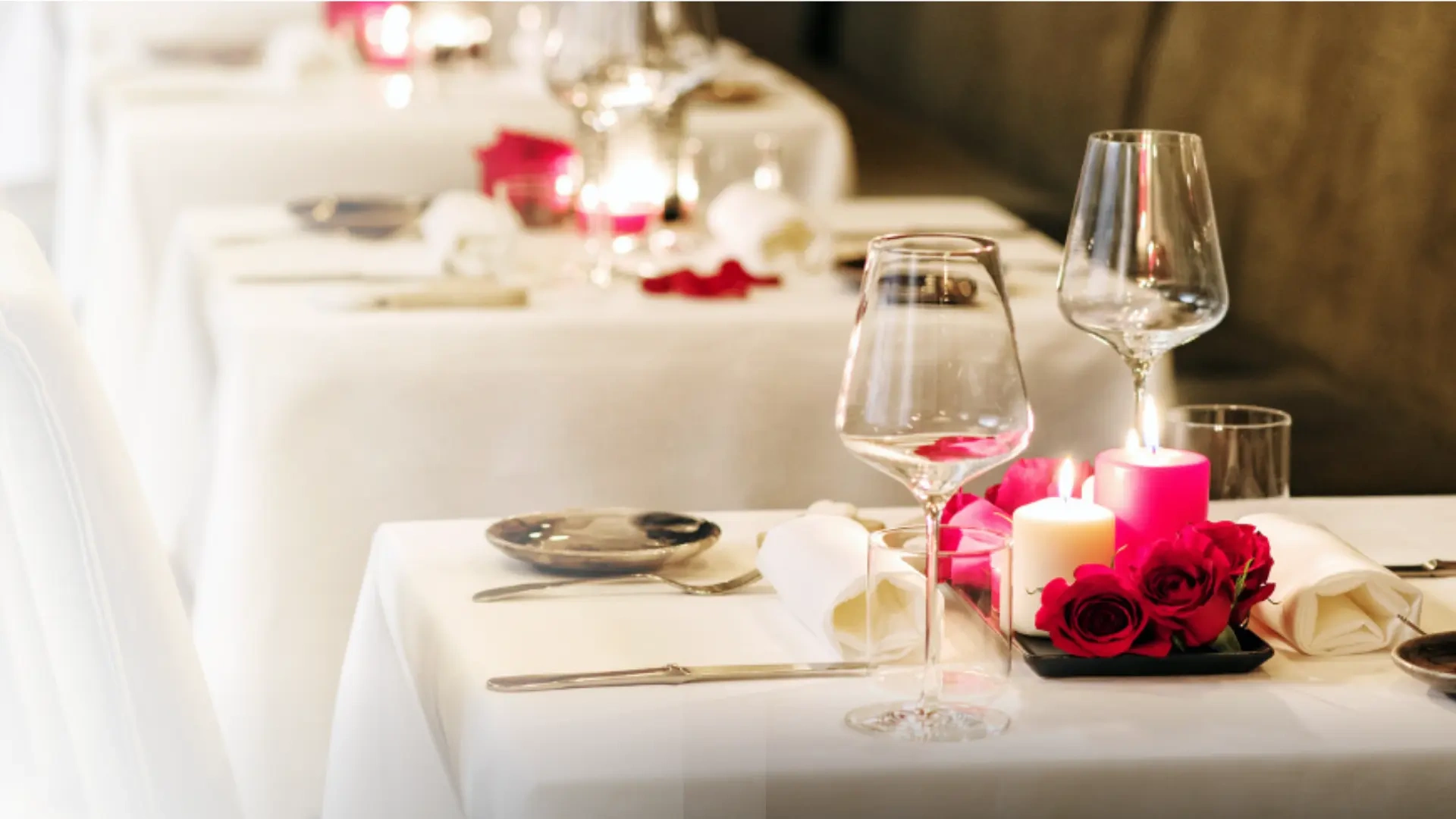 Fresh white tablecloth on a Manchester restaurant table set for evening service