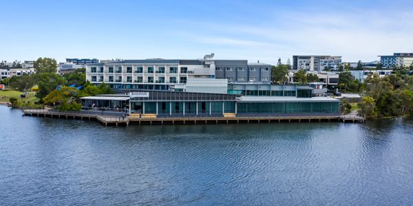 Aerial view of Best Western North Lakes Hotel overlooking Lake Eden