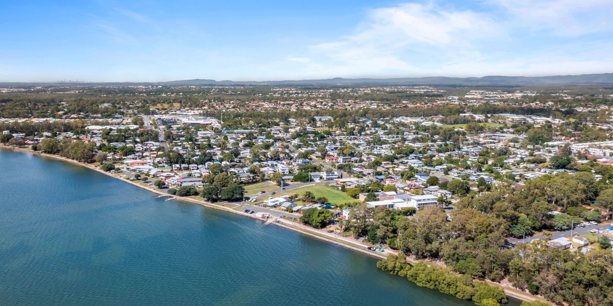 Aerial view over the waterfront in Deception Bay Queensland showcasing coastal lifestyle.