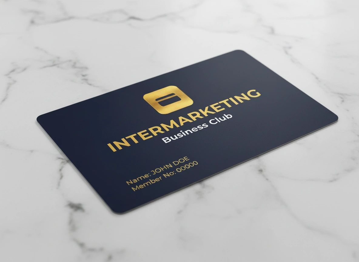 Sleek black and gold Intermarketing Business Club membership card on marble.