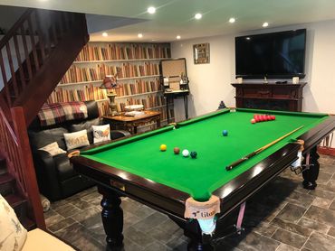 Games Room - Snooker / Pool and table games with large screen TV and sound system.