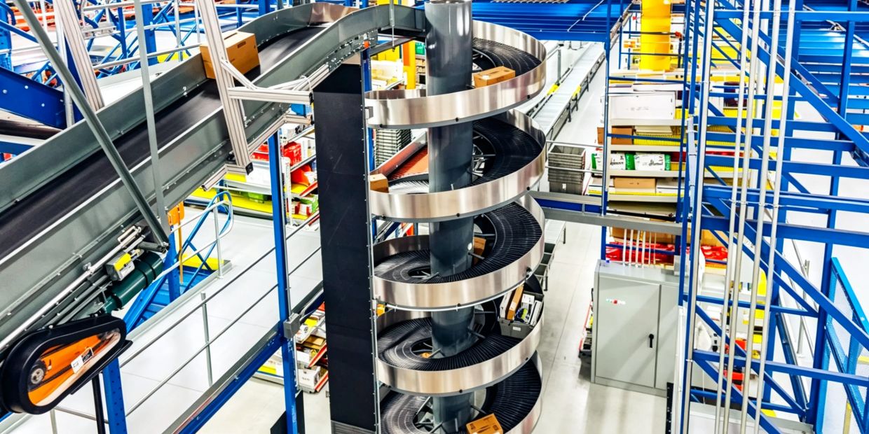 Spiral conveyor system in a warehouse.