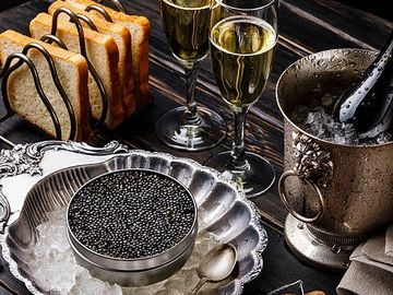 Caviar with toasts and champagne.