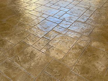 Monterrey Ashlar Stamp with Mohave base and Walnut accent colors.