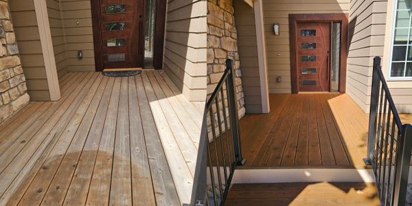Before and after images of a wooden porch cleaned and restored.