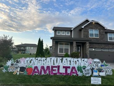 Yard sign congratulating Amelia on her graduation.