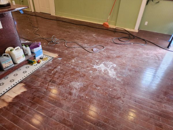 Before sanding hardwood flooring in a small restaurant in Ridegwood, Brooklyn.
