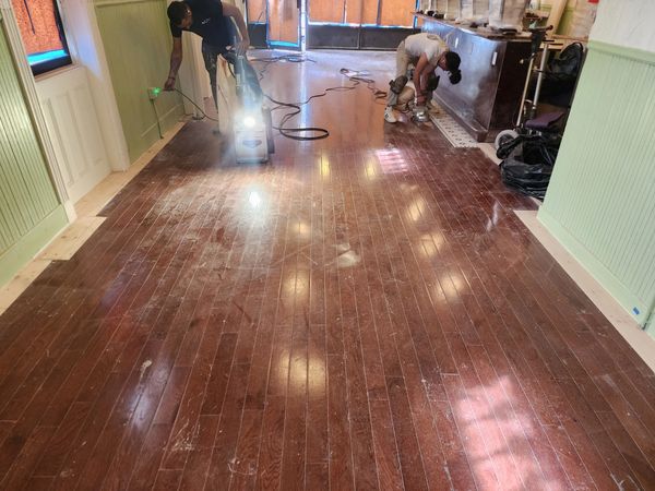 Before sanding hardwood flooring in a small restaurant in Ridgewood, Brooklyn.