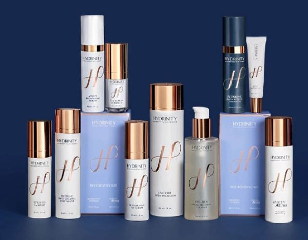 Hydrinity skincare products arranged against a dark blue background.