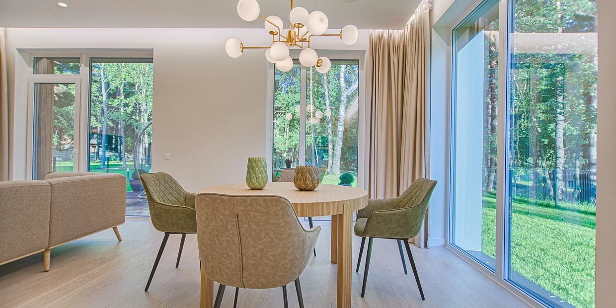 A dining area located in a clean home.