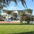 Front of home with helicopter out front