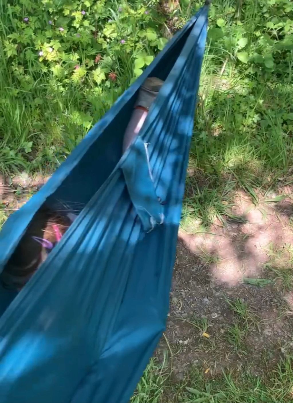 Child swinging in a hammock 