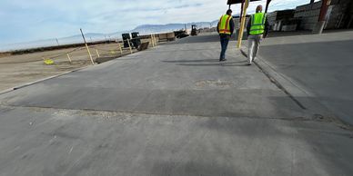 Bakersfield Paving Inc conducting a concrete estimate.