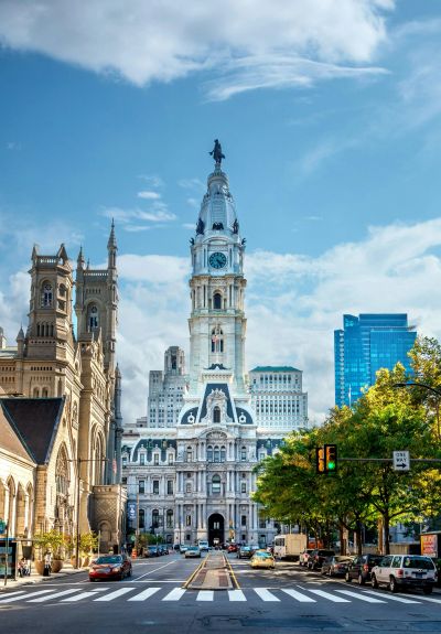 Philadelphia City Hall under a bright sky.