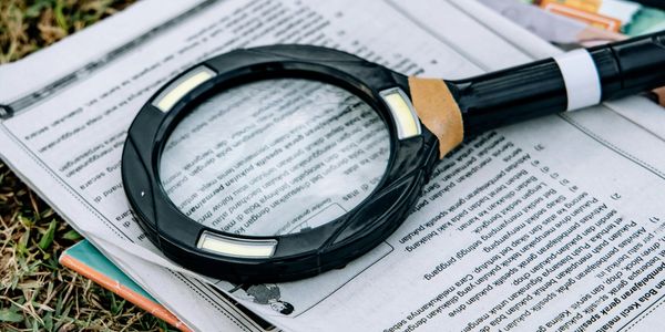 Insights made actionable. magnifying glass on market research report. marketing strategy.