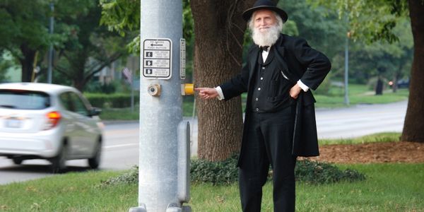 Kerry Altenbernd dressed as John Brown at stop light he got installed - photo credit Jurgen Vsych