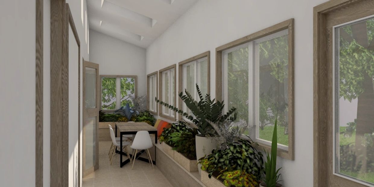 Long sunroom with skylights and built in bench seating that can be either greenhouse, seating or din